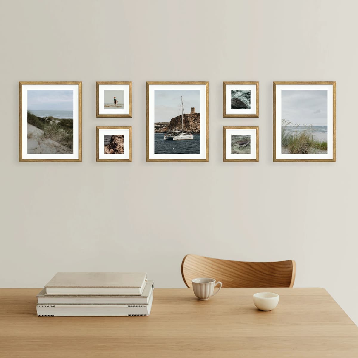 The Harbor Line gallery set is a fluid arrangement that stretches across the wall like a shoreline. With a mix of vertical, horizontal, and square frames, it creates a natural rhythm — perfect for landscapes, travel memories, or serene everyday moments. Ideal for living rooms, workspaces, or dining areas, this layout brings balance and openness into any space.
