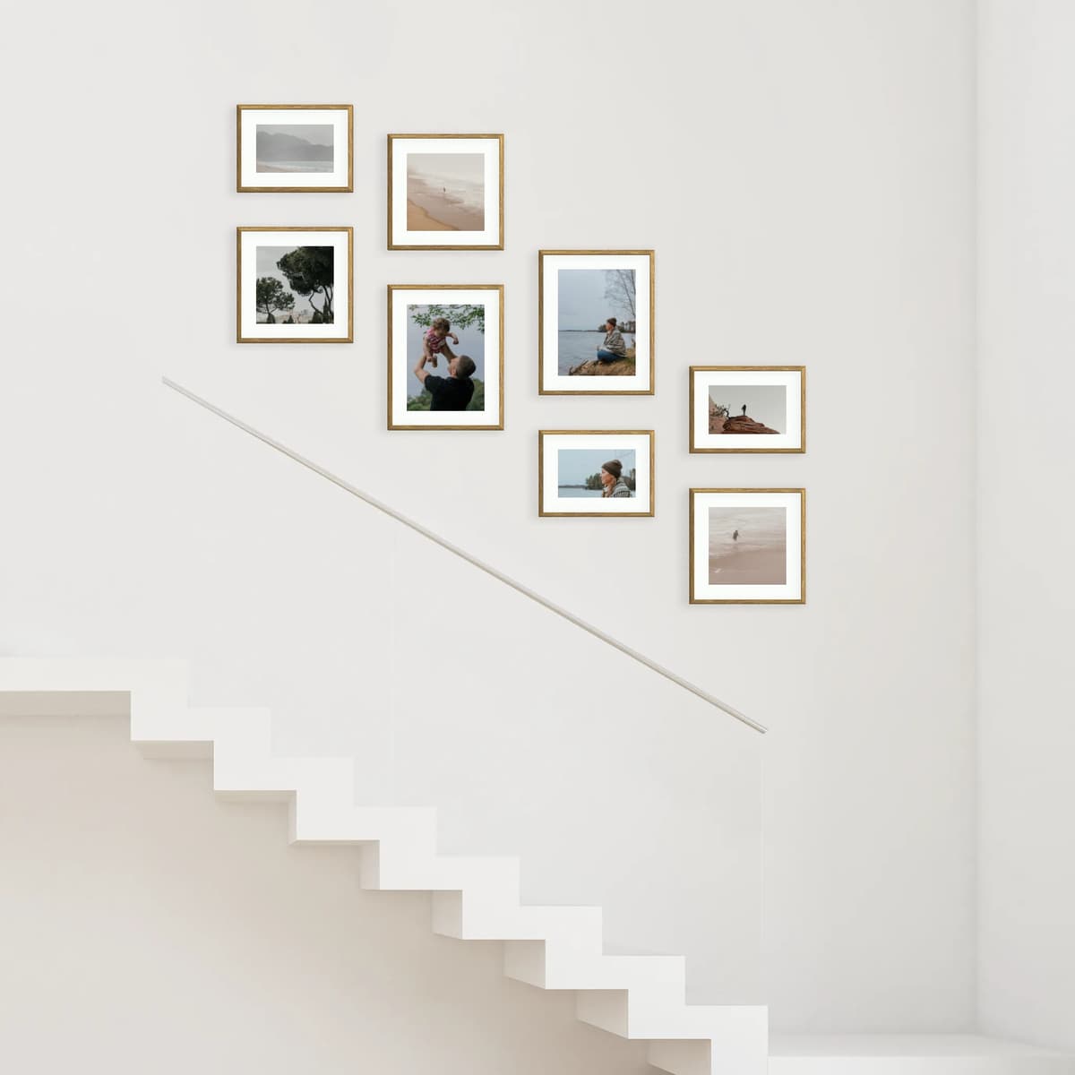 A cascading gallery wall that follows the natural flow of your stairs.
This organic, geometric layout transforms vertical movement into a visual journey — perfect for family memories, landscapes, or a personal narrative that grows with every step.